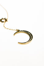 Collier Blanc dans Noir Les Bijoux De Claclou
