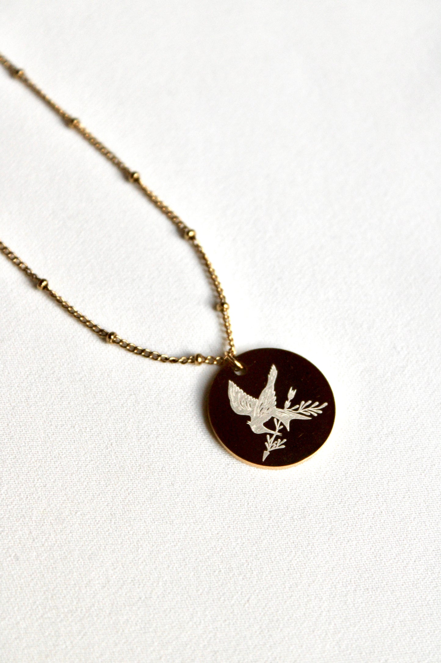 Collier pendentif HUNGER GAMES Les Bijoux De Claclou
